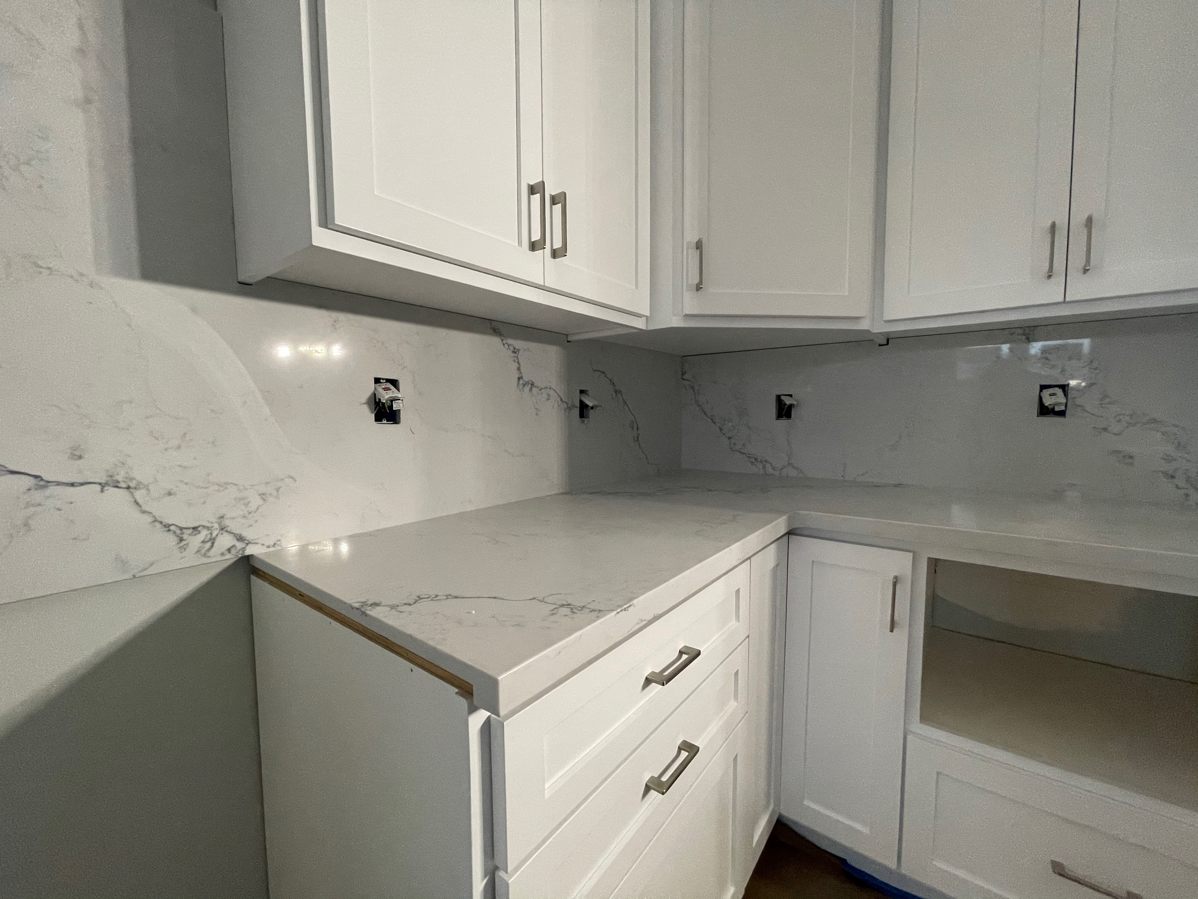 Quartz countertop with matching backsplash